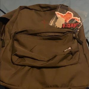 Travis Scott backpack w/ assorted stickers.